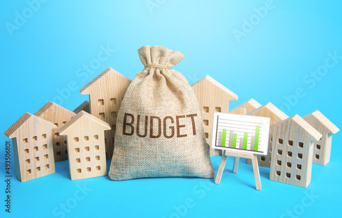 Money bag budget and real estate. Municipality budget of community. Collection of taxes and fees. City services. Effective management, governance of funds. Energy efficiency, urban planning innovation photo