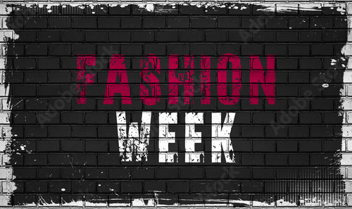 fashion week concept on black wall 