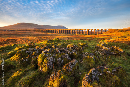 Wide angle view of Ribblehead Viaduct on a beautiful sunny morning. Yorkshire Dales National Park, UK. photo
