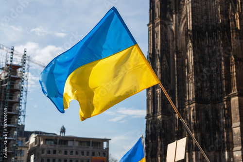 flags and symbols at a peaceful protest in defense of Ukraine