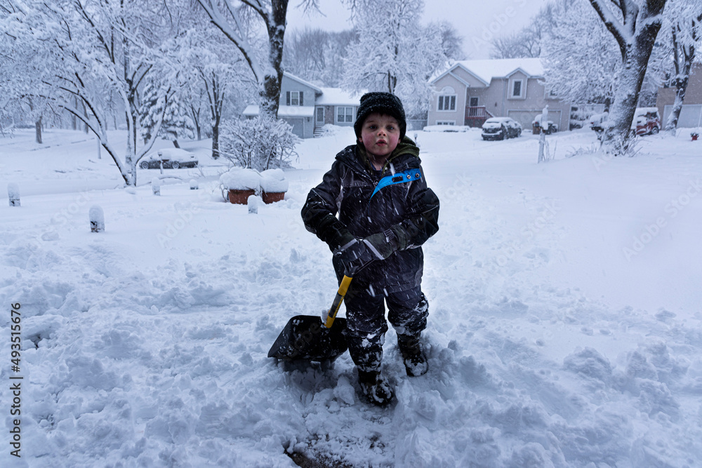 Young Boy Shoveling