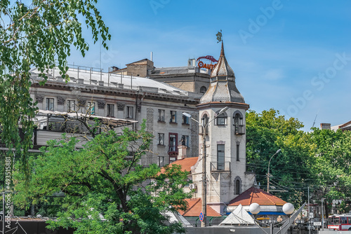 Mykolaiv, Ukraine - July 26, 2020: A modern building with creative architecture on Central Avenue in Mykolaiv. Beautiful cityscape on a sunny summer day photo