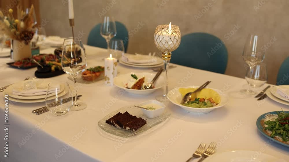 food and snacks on the festive table in the restaurant food and snacks on the festive table in the restaurant