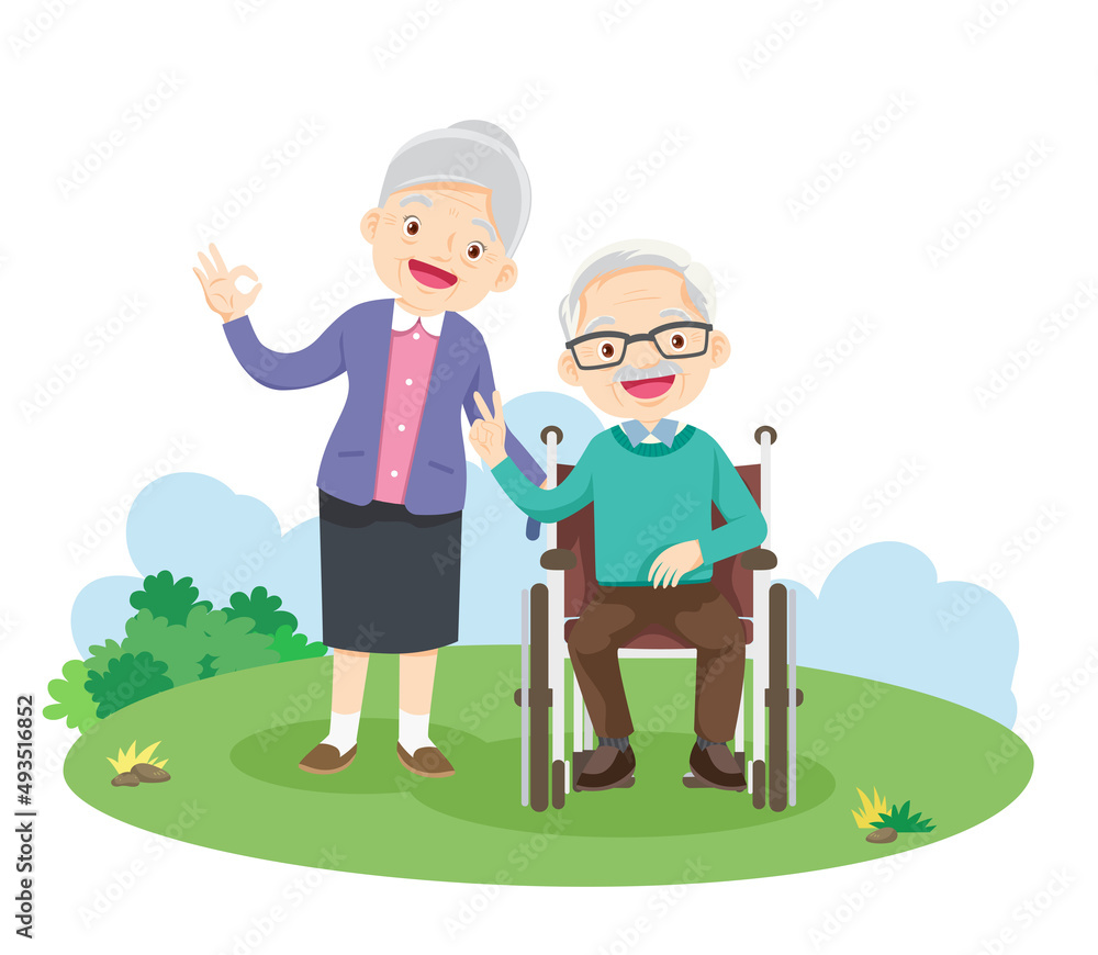 happy elderly couple victory hand sitting on wheelchair in the park happy elderly couple victory hand sitting on wheelchair in the park