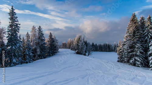 Trail through idyllic winter landscapes at the Schoeckl mountain in Austria near Graz
