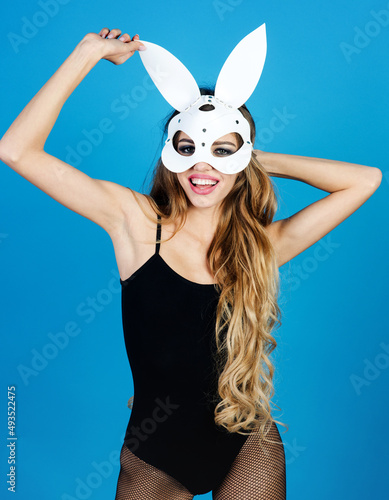 Easter rabbit girl. Happy woman in sexy lingerie and bunny mask.