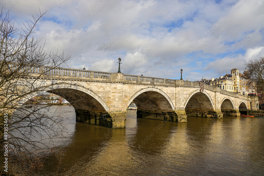 The scenic view of Richmond bridge in winter. Richmond Bridge is an 18th-century stone arch bridge that crosses the River Thames at Richmond.