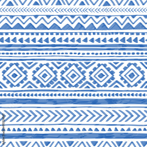 Blue and white geometric pattern. Ethnic and tribal motifs. Striped background drawn with markers. Vector illustration.