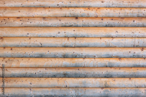 Weathered wooden background made of plain planks