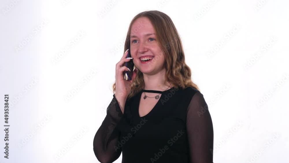 Young blond beautyful woman on the phone on white background Young blond beautyful woman on the phone on white background
