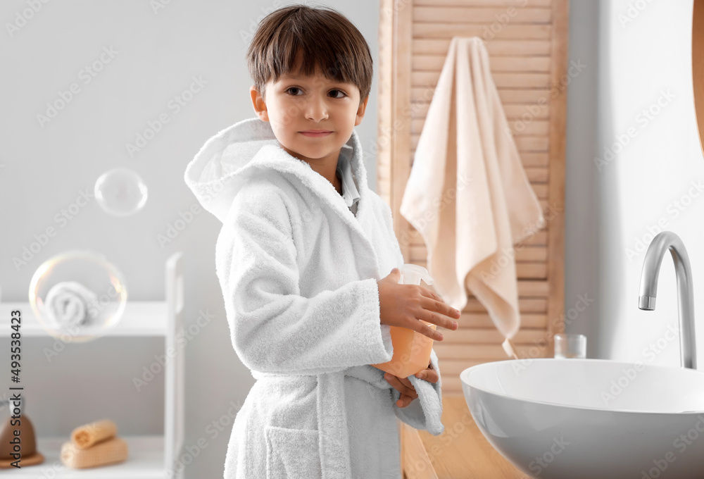 Cute little boy washing hands in bathroom Cute little boy washing hands in bathroom