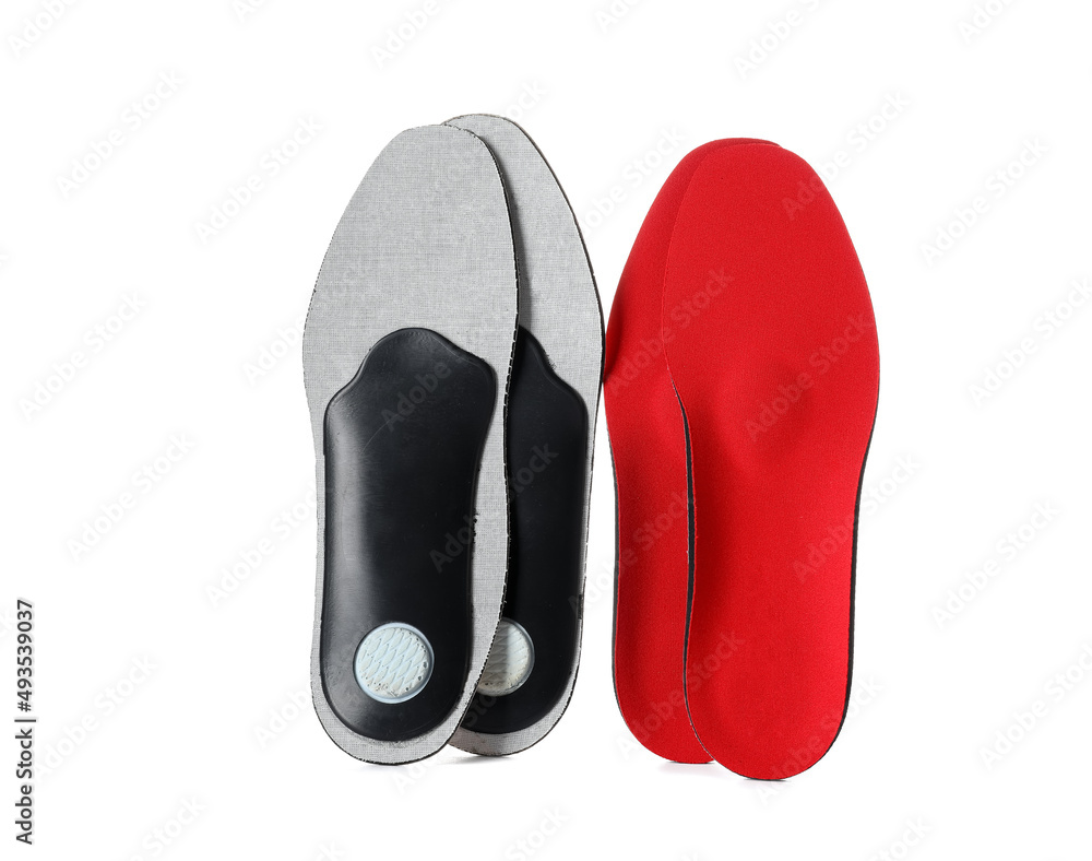Different orthopedic insoles on white background Different orthopedic insoles on white background