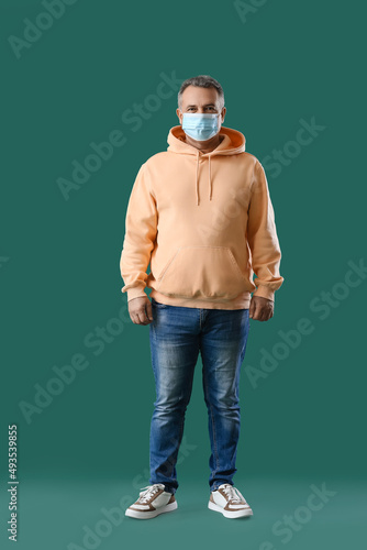 Senior man in medical mask ...