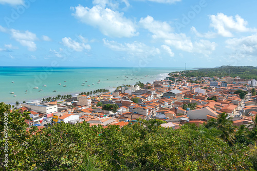 Fototapeta Naklejka Na Ścianę i Meble -  Aerial view of Maragogi, AL, Brazil. Landscape of the city and the Maragogi beach, famous tourist destination of the brazilian coast.
