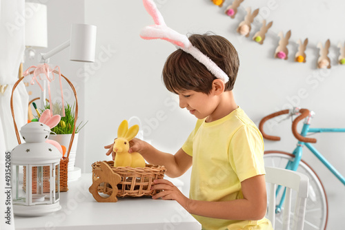 Cute little boy looking for...