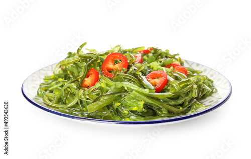 Plate with healthy seaweed salad on white background