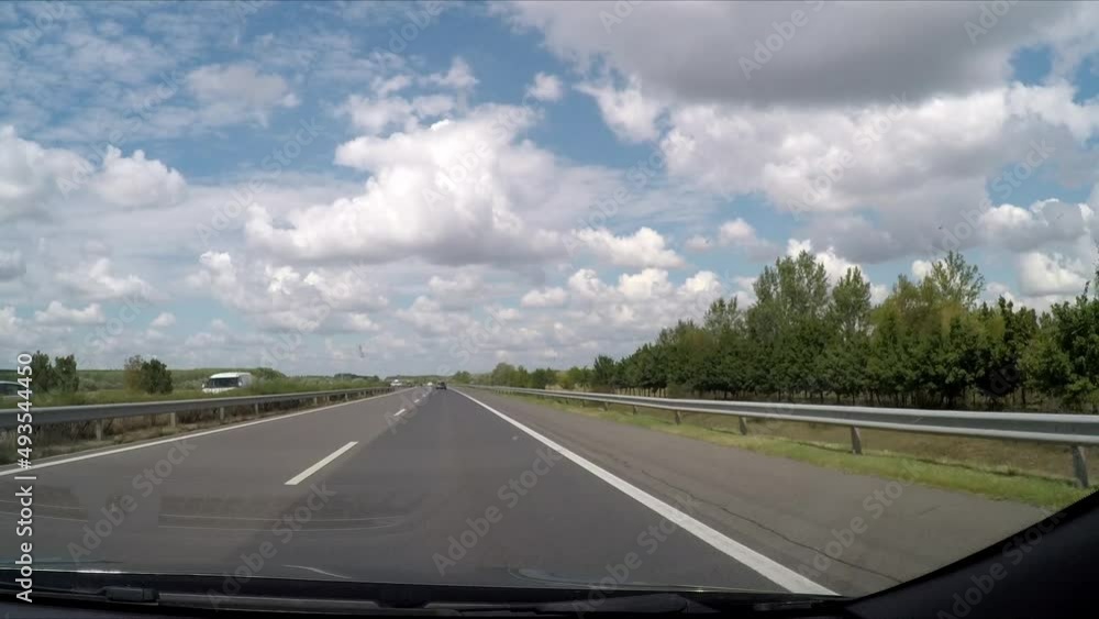 driving a highway in the sunshine driving a highway in the sunshine