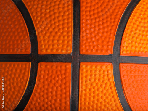 Macro shot. Basketball details. Background. Wallpaper. Texture. Sports games, competitions, championship, game, healthy lifestyle, training. © Anton
