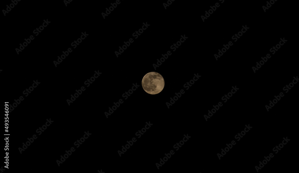 Full moon on dark night sky background Full moon on dark night sky background