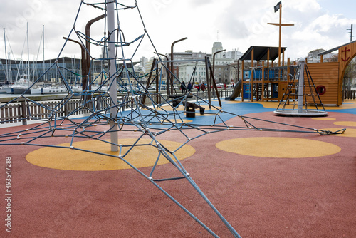 Children's playground without people in rainy weather