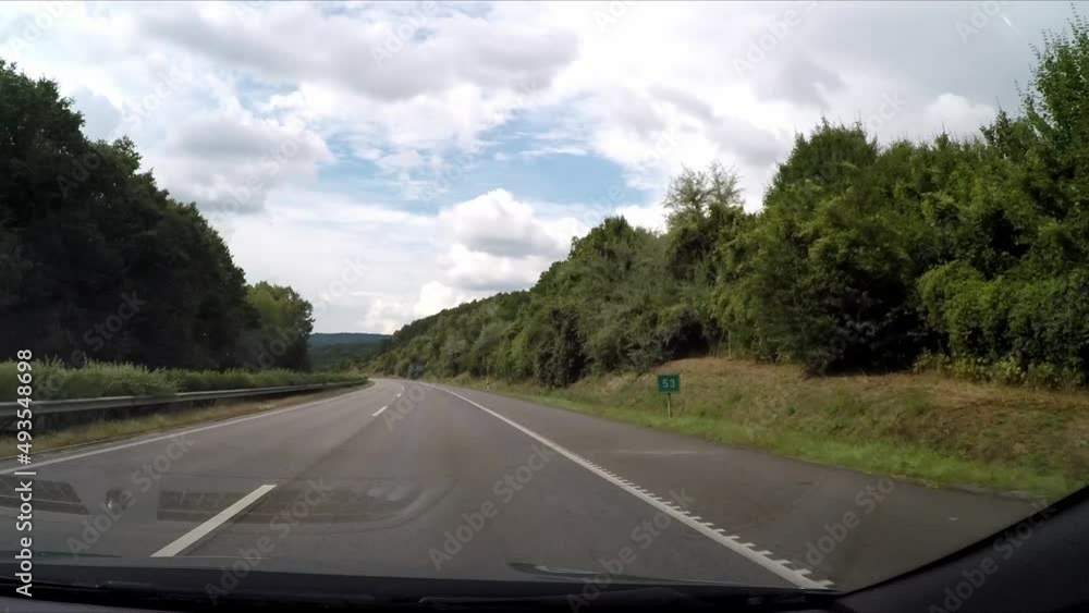driving a highway in the sunshine driving a highway in the sunshine