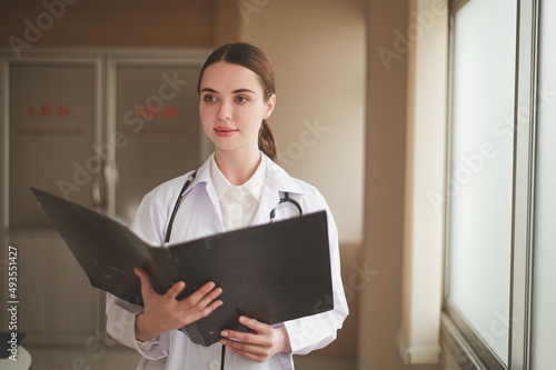 woman Caucasian doctor standing in hospital