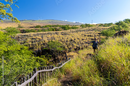 Female Hiker on The Ala Kahakai Trail National Historic Trail, Hawaii Island, Hawaii, USA photo