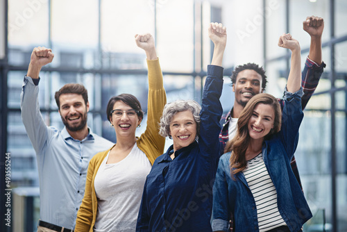 Success needs to be celebrated. Cropped portrait of a group of businesspeople celebrating their success. © Jadon B/peopleimages.com