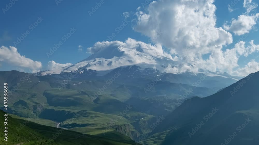 Beautiful view of Mount Elbrus and clouds before sunset, North Caucasus mountains, Russia, timelapse 4k Beautiful view of Mount Elbrus and clouds before sunset, North Caucasus mountains, Russia, timelapse 4k