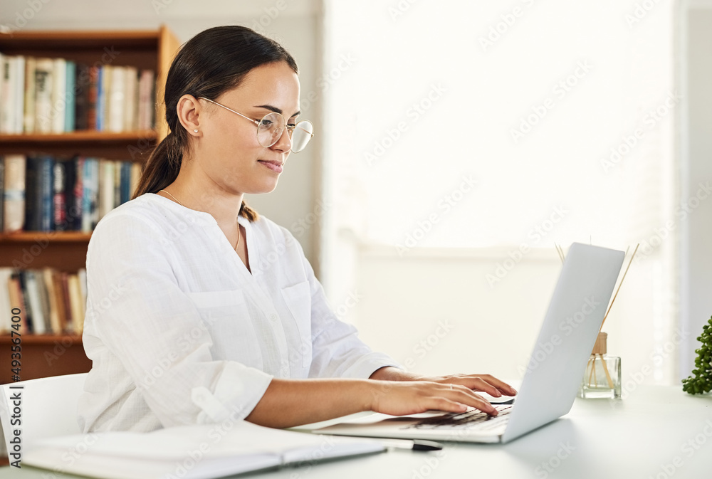 Ive been feeling great lately. Shot of a beautiful young businesswoman working from home. Ive been feeling great lately. Shot of a beautiful young businesswoman working from home.