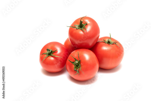 Red tomato on a white background. For grocery stores.