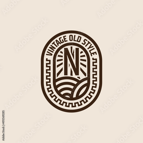 Vintage frame letter N logo design. Antique label Suitable for tattoo studio, brewing, whiskey, farm