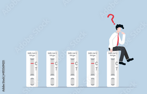 Covid-19 rapid antigen testing before being allowed to work concept. Businessman waited for his result of Covid test from using ATK kit.