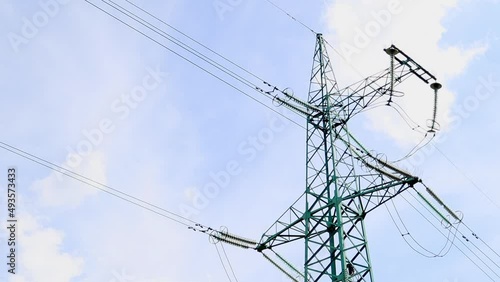 High voltage power plant. High voltage high tower with distribution cables. Transformation station and power plant. Green energy sustainability and renewable energy concept.