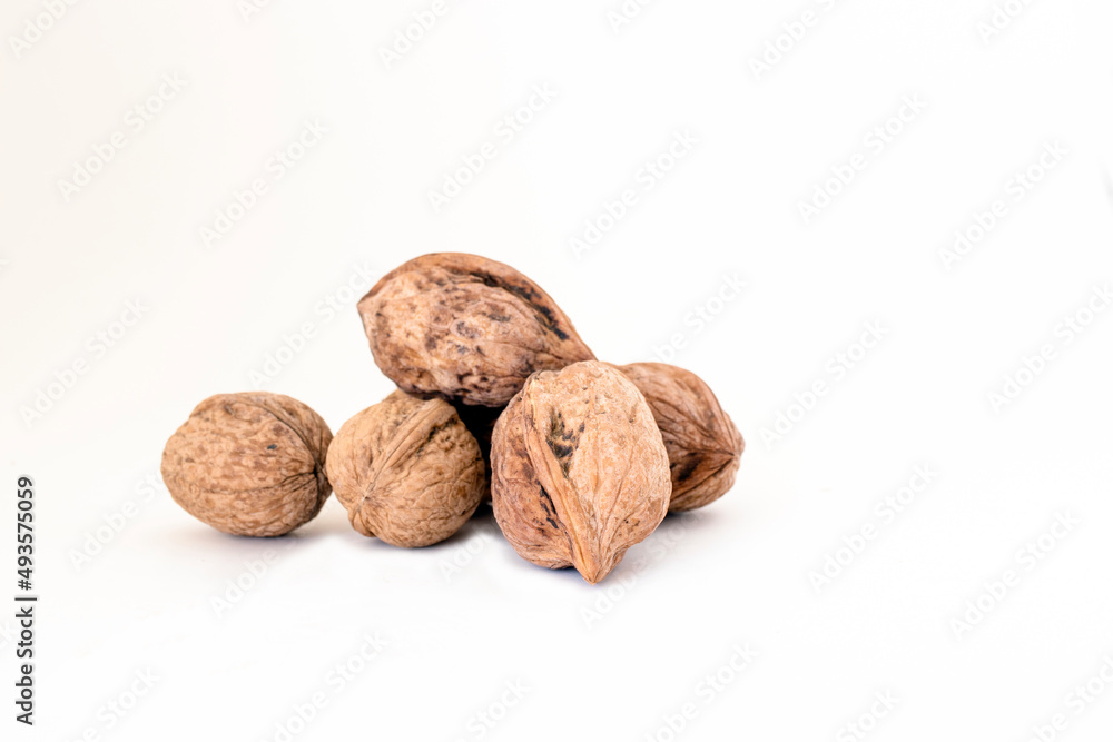 Shelled walnuts isolated on a white background. Shelled walnuts isolated on a white background.
