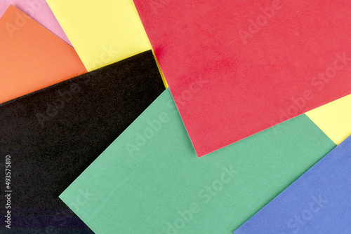 multicolor abstract background made of colored paper sheets