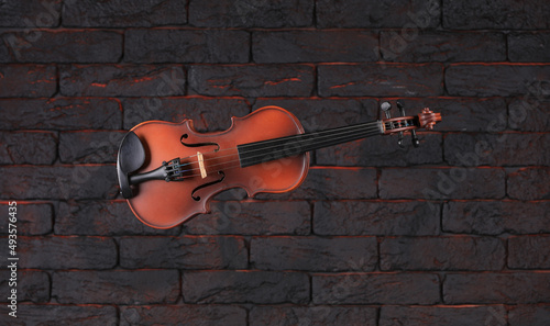  violin on black brick background