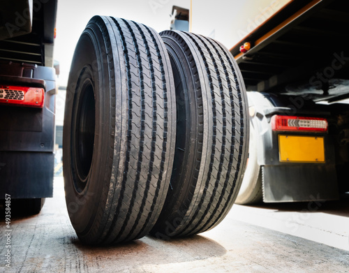 Big Truck Wheels Tires. Semi Truck Spare Wheels for to Change Repair. Truck Tyres. Auto Repair Service Shop.   © Siwakorn1933