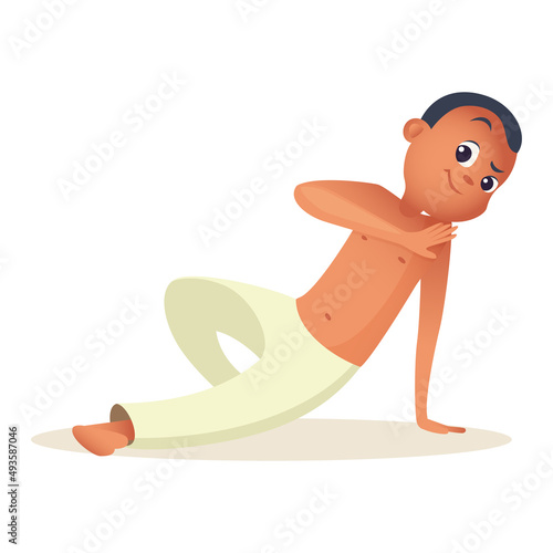 Serious boy doing capoeira movement from below while standing on one arm and leg. Child goes in for sports