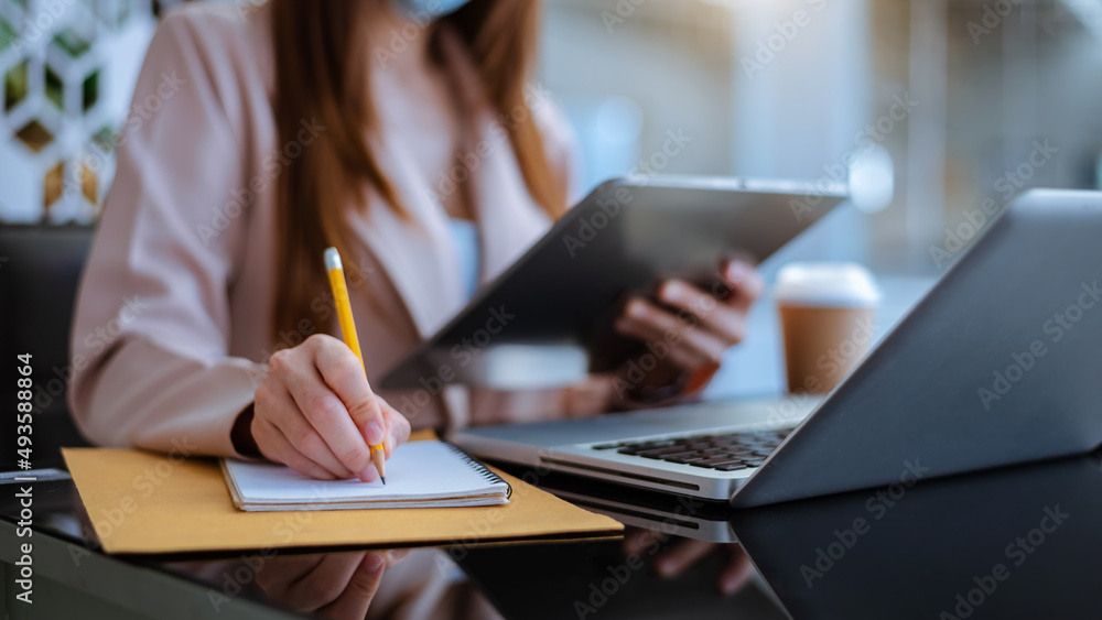 Businesswomen analyzing investment graph and discussing plan new start up project. Finance task.. Businesswomen analyzing investment graph and discussing plan new start up project. Finance task..