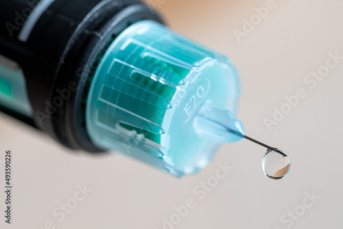 Multiple Dose Insulin Therapy, needle with drop of insulin photo