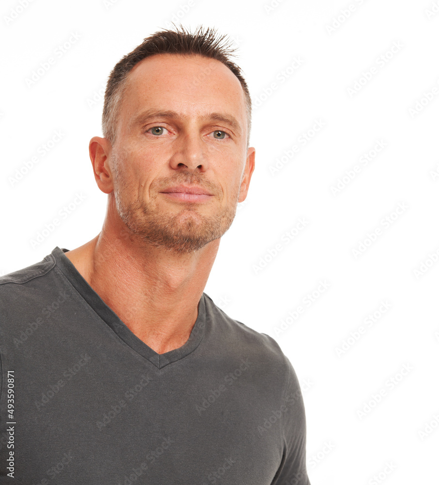 Obraz premium Im the strong and silent type. Handsome mature man isolated on white - head and shoulders portrait.