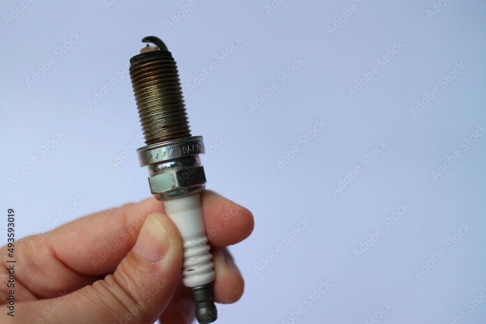 old spark plugs on a white background old spark plugs on a white background