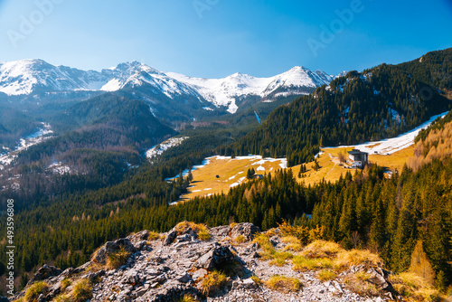 Fototapeta Naklejka Na Ścianę i Meble -  Alpine meadows and snowy peaks in the spring High Tatras mountains. Zakopane, Poland.