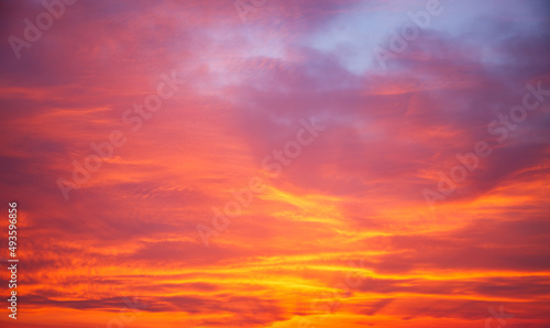 Fantastic colorful sunrise with cloudy sky. © Leonid Tit