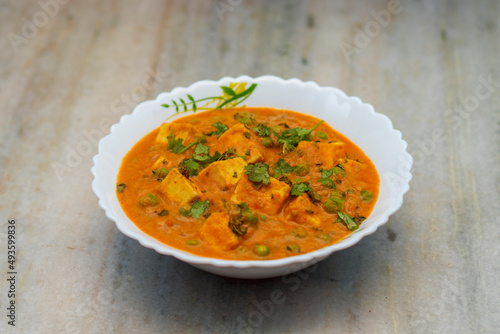 Famous Indian dish "matar paneer" is ready to serve. 