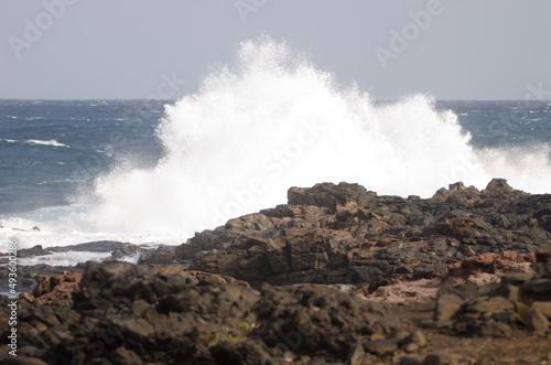 Wave breaking against the shore. El Confital. La Isleta Protected Landscape. Las Palmas de Gran Canaria. Gran Canaria. Canary Islands. Spain.