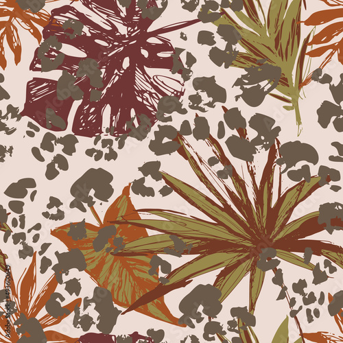 Abstract tropical leaves, grunge leopard camouflage spots background.