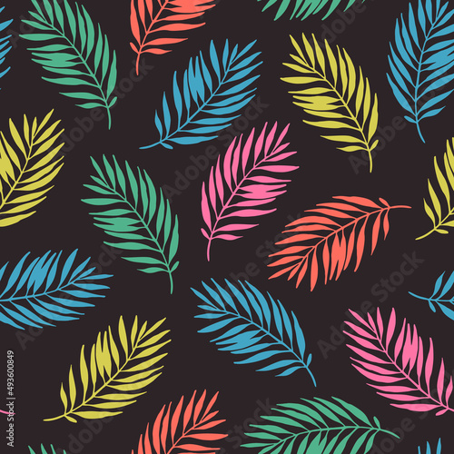 Simple palm leaf seamless pattern. Nature print with colorful palm leaves