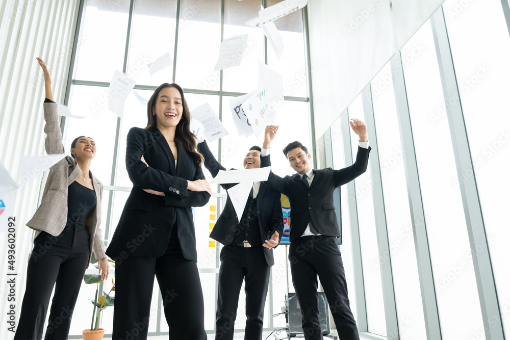 Overjoyed young asian businesspeople throw paper up in air feel excited about successful startup project, happy asian colleagues have fun celebrate business success at office meeting Overjoyed young asian businesspeople throw paper up in air feel excited about successful startup project, happy asian colleagues have fun celebrate business success at office meeting